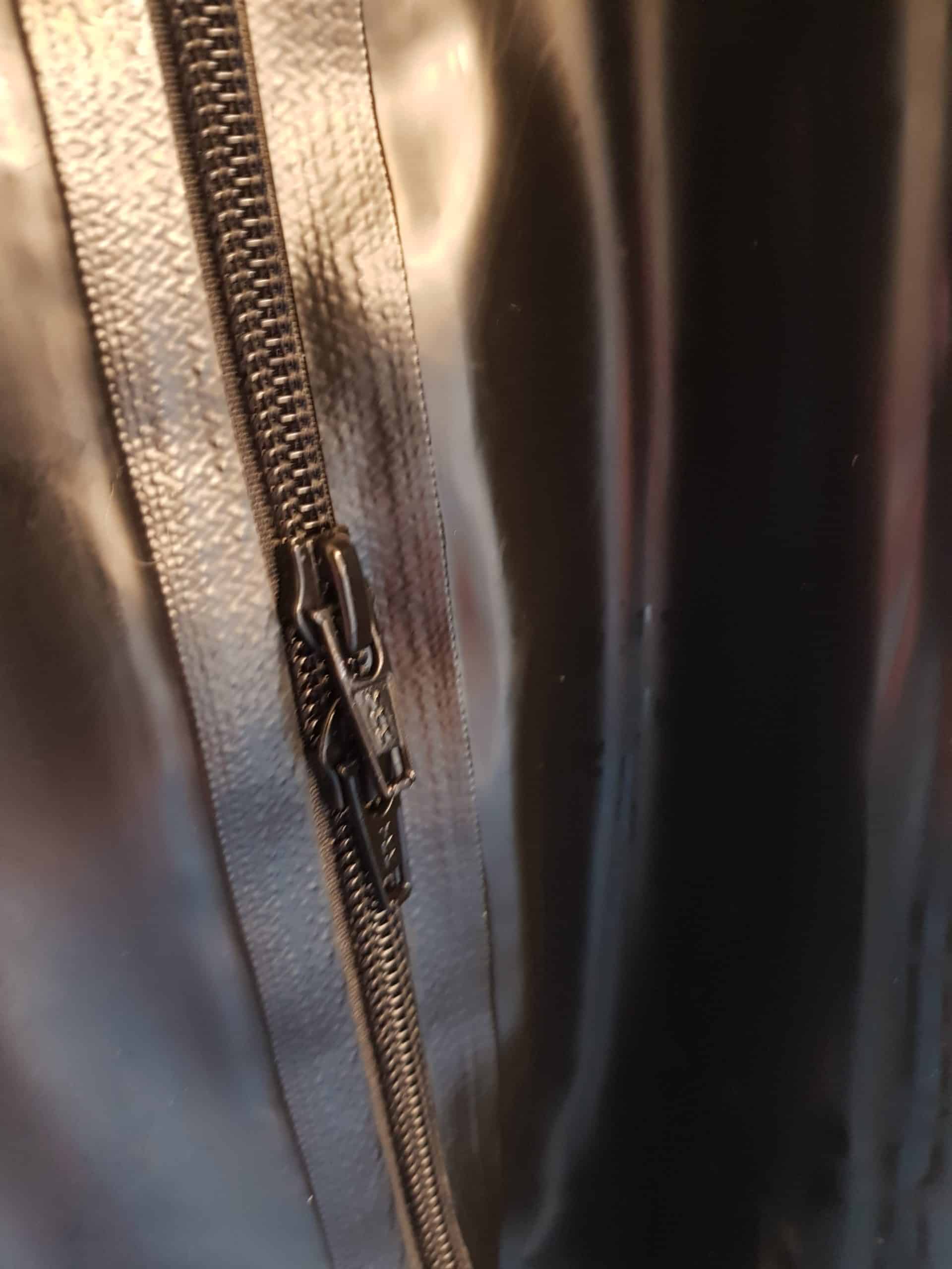Zipper in latex catsuit