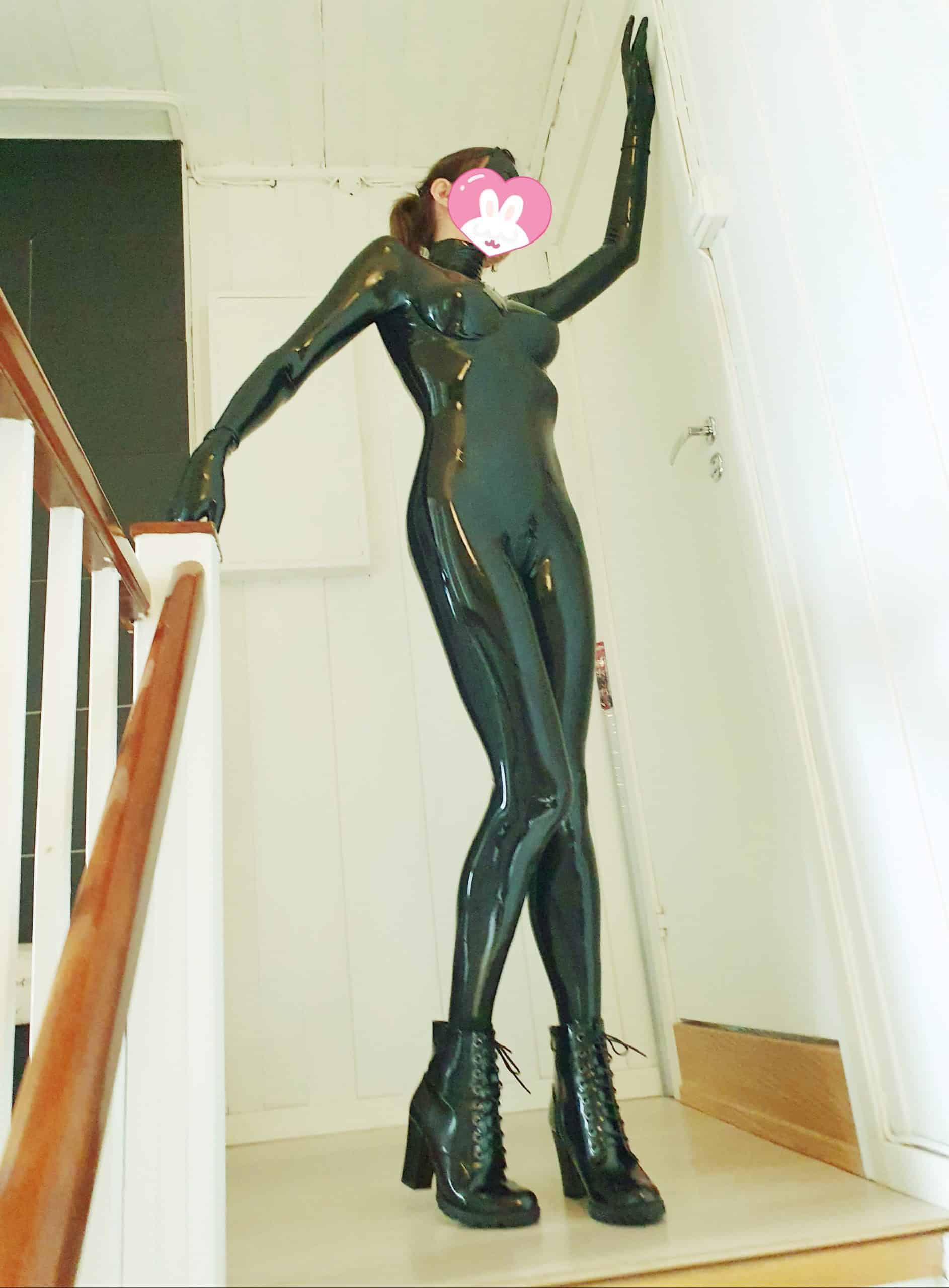 Lady in latex catsuit